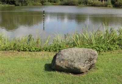 The glacial erratic boulder at the edge of the Pit